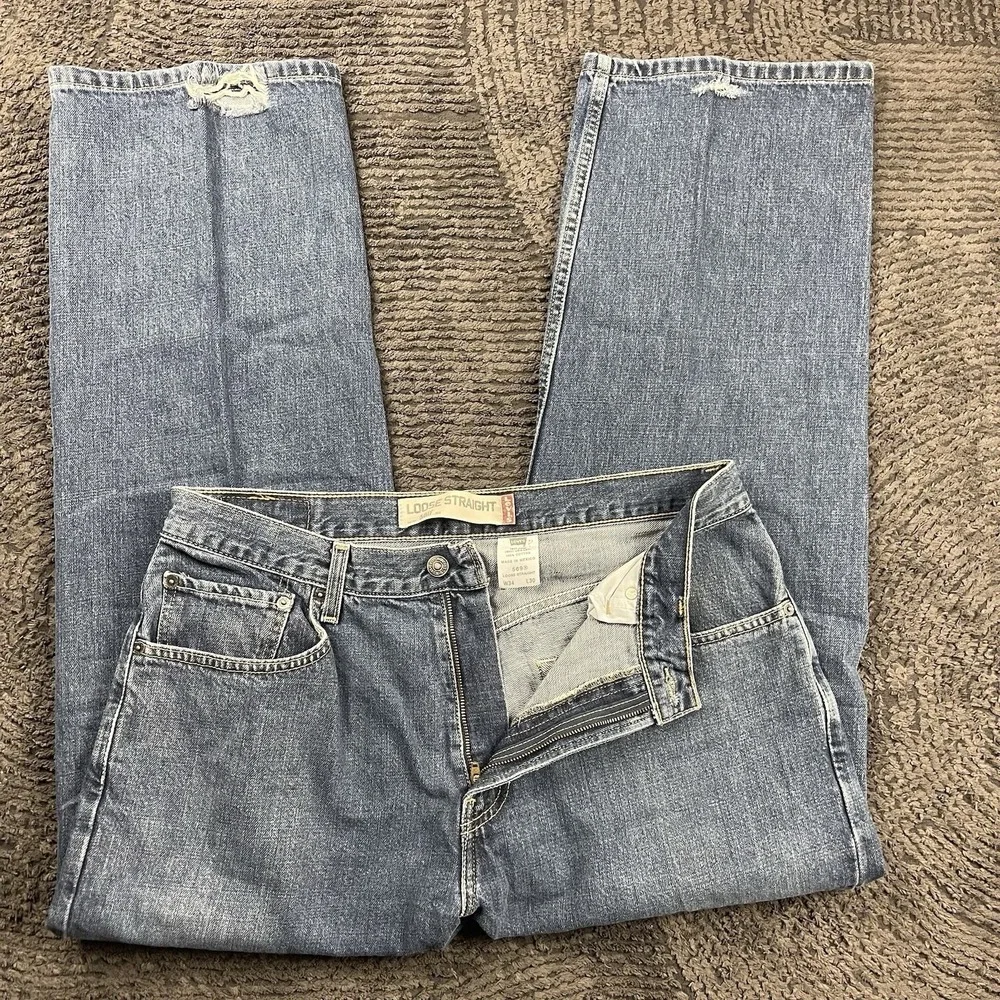 Vintage Levi's 569 Loose Straight Jeans Men's 34x29 Blue Denim Distressed Hem
